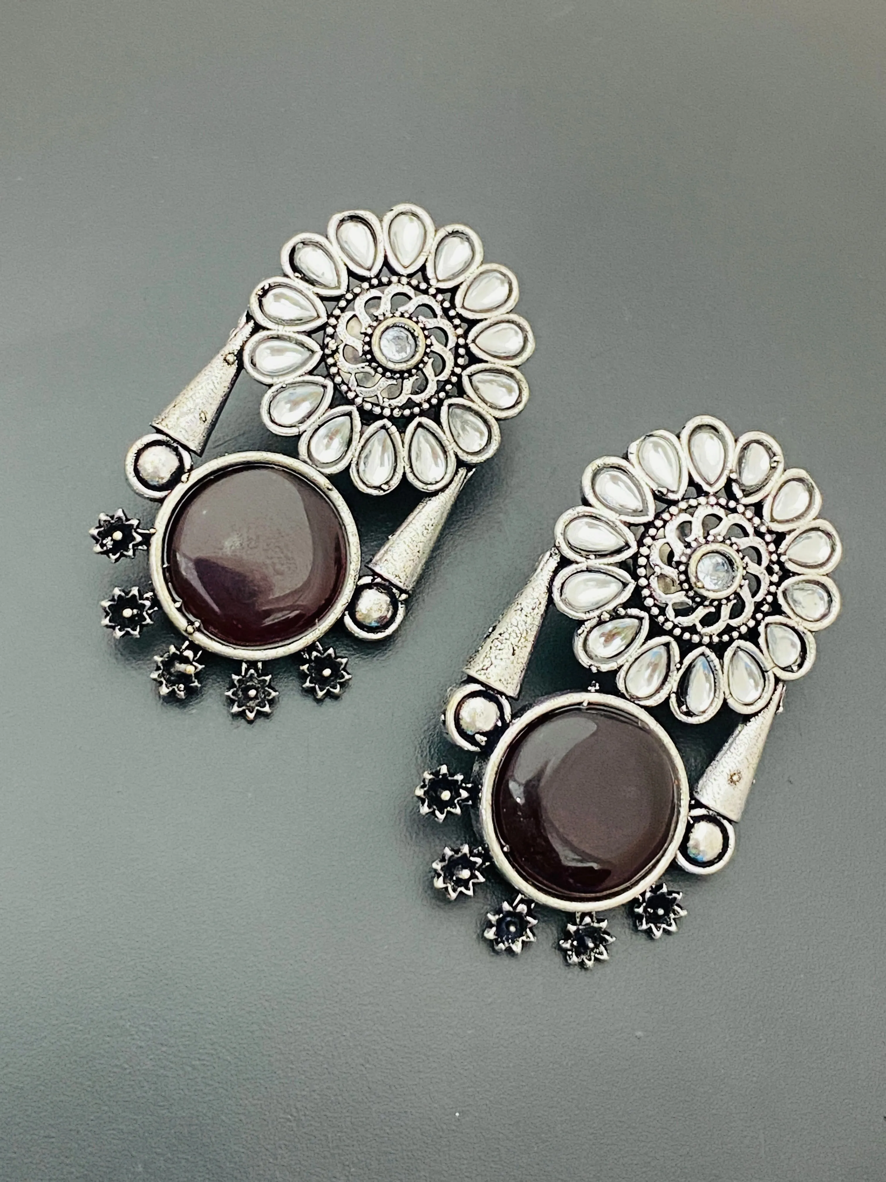 Alluring Maroon Color Oxidized Floral And Round Designed Earrings