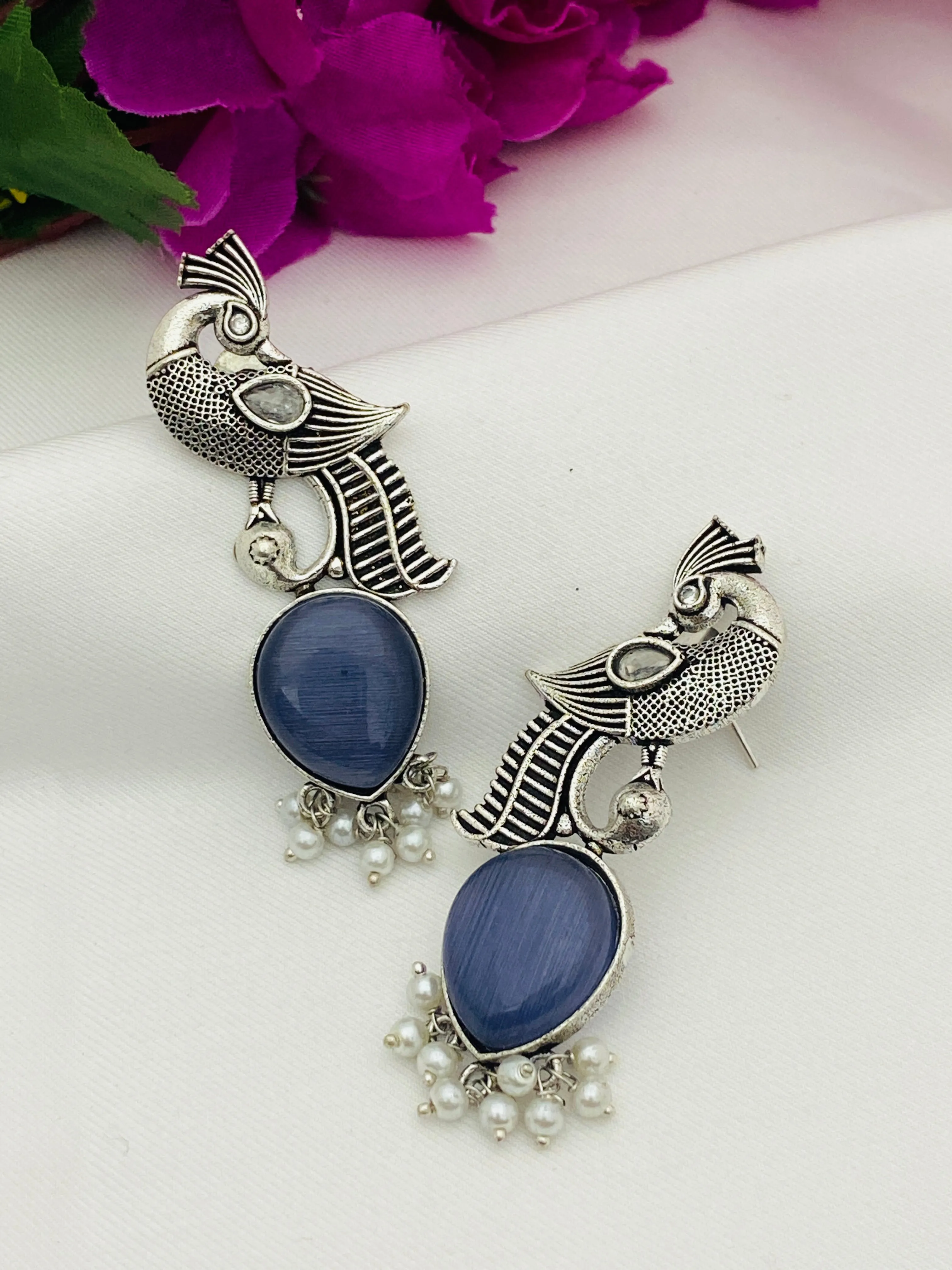 Elegant Blue Stoned Peacock Design Silver Toned Oxidized Earrings With Pearl Beads