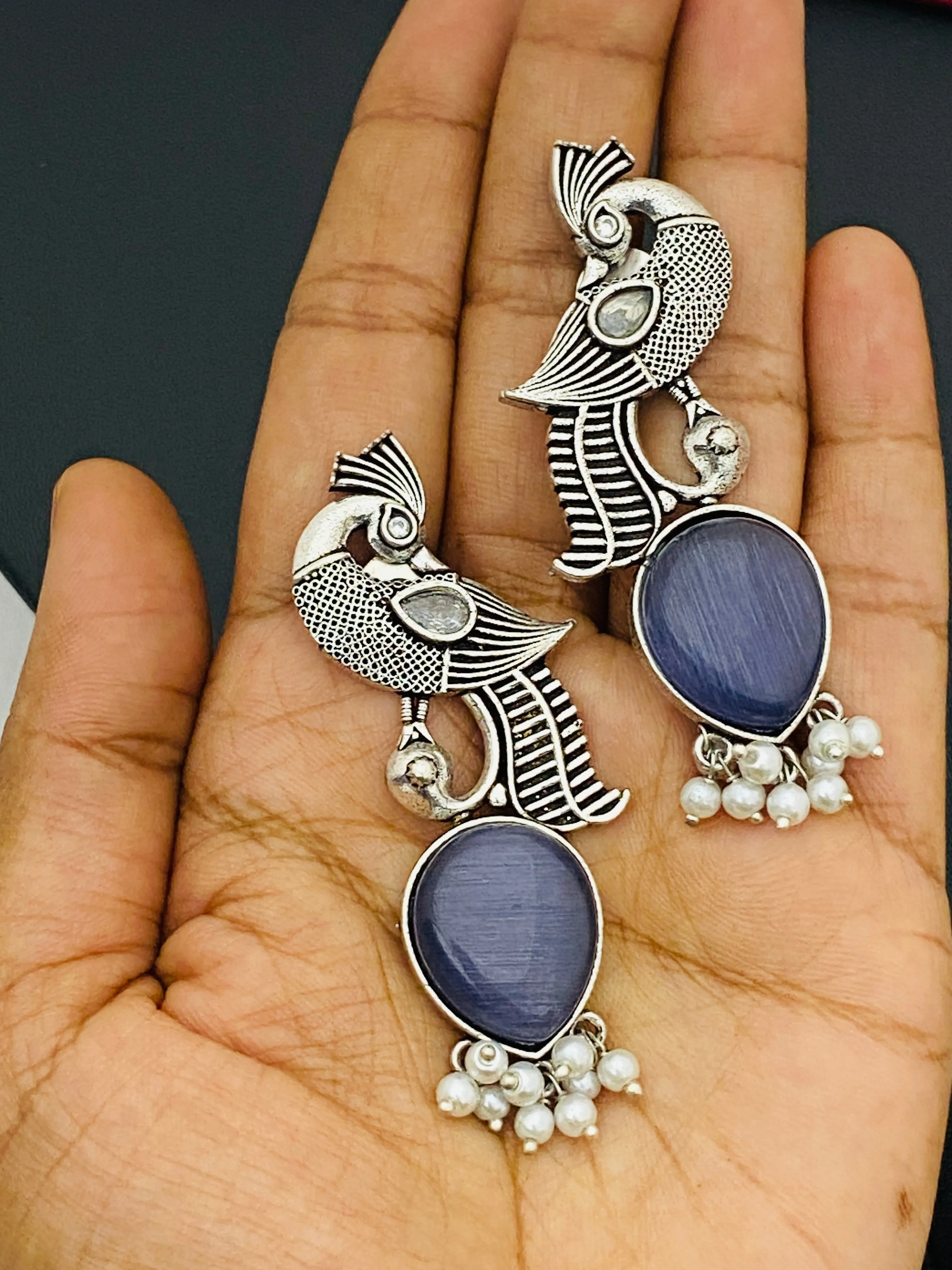 Elegant Blue Stoned Peacock Design Silver Toned Oxidized Earrings With Pearl Beads